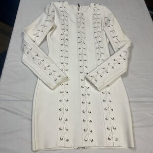 White mini bodycon dress with lace up detail and long sleeves - size S